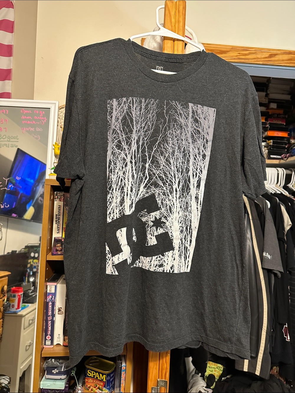 DC Men’s Black Short Sleeve Tee with White Graphic Design